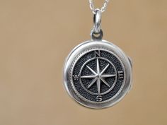 Handmade round 925 sterling silver compass locket necklace, antiqued and polished by hand.  Measurement, Locket is about 0.8 inch (20mm) wide. It hangs on 18 inch sterling silver chain with lobster clasp as shown on the model, If you are purchasing the locket with chain, please leave me a note when checking out of your preferred chain length (it can be adjusted from 16 to 24 inches without additional charges ) or I will send it with default 18 inch length chain with lobster clasp closure. Medallion Locket Necklace With Compass Design For Gift, Compass Design Medallion Locket Necklace As Gift, Compass Locket Necklace, Compass Design Round Pendant Locket Necklace As Gift, Compass Design Locket Necklace As A Gift, Antique Medallion With Compass Design Jewelry, Antique Silver Jewelry With Compass Design, Sterling Silver Compass Necklace For Travel, Antique Compass Medallion Jewelry