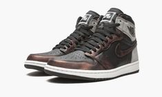 The Air Jordan 1 High OG “Patina” is a premium colorway of Michael Jordan’s first signature shoe that was released in March 2021.  Several indirect influences inform the look of the “Patina,” beginning with the grey nubuck overlays on the collar and heel which, combined with the supple black leather on the collar and mid-panel, call to mind the original “Shadow” Jordan 1.  The overlays on the forefoot, eyestay, and Swoosh are given an opulent bronzed patina finish that contrasts with the black l Teal Nikes, Jordan 1 High Og, Air Jordan 1 Retro High Og, Black Wings, Air Jordan 1 Retro High, Nike Air Jordan 1, Air Jordan 1 High, Jordan 1 High, Air Jordan 1 Mid