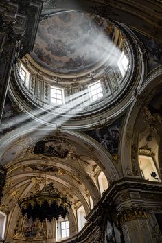 the inside of an old building with many windows