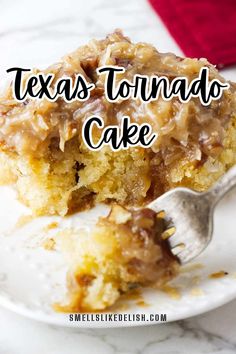 a close up of a piece of cake on a plate with the words texas tornado cake