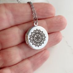 "Introducing my Mandala Locket Collection - a timeless piece of jewelry that is perfect for any occasion. As a symbol of the cosmos or universe, the entire design is symmetrical and balanced. Some spiritual traditions use mandalas for meditation or for marking a spiritual space. The word mandala itself simply means \"circle\" in Sanskrit. This silver plated brass locket is a small size, measuring 20mm in diameter. It opens up to reveal a secret place where you can store your most cherished photo Etched Round Disc Jewelry As Gift, Spiritual Round Pendant Jewelry With Engraving Option, Personalized Spiritual Medallion Jewelry, Spiritual Medallion Jewelry With Engraving Option, Personalized Spiritual Medallion Necklace For Gifts, Nickel-free Medallion Necklace Gift, Engraved Round Medallion Necklace As Gift, Engraved Round Medallion Necklace Gift, Spiritual Medallion Jewelry For Personalized Gift