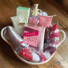 a basket filled with personal care items on top of a wooden table