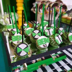 green and white desserts on display in a store