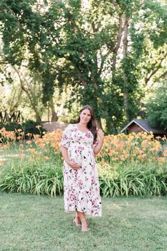 Remain a blooming vision in our Catalina Dress. This lovely dress features a hard-to-miss pink floral print that will remind you to stop and smell the roses. The full-length tiered skirt and half sleeves provide modest coverage for formal occasions. Meanwhile, the stretchy, elastic waistband grants bump-friendly comfort. Pair it with high heels for a look that will make your heart skip a beat. STYLE INFO & CARE Tiered Skirt Fully lined 100% polyester Maternity friendly style Machine Washable in Flowy Rose Print Maxi Dress, Modest Short Sleeve Floral Dress For Garden Party, Feminine Short Sleeve Maxi Dress For Garden Party, Pink Rose Print Maxi Dress For Garden Party, Modest Short Sleeve Dress For Garden Party, Maternity Short Sleeve Maxi Dress For Spring, Short Sleeve Floral Print Maxi Dress For Garden Party, Short Sleeve Floral Maxi Dress For Garden Party, Pink Floral Print Maxi Dress For Maternity