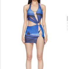 a woman in a blue swimsuit with cut outs