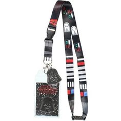 Disney Star Wars is back!  This double-sided lanyard features Darth Vader.  It has a classic lobster clasp to hold your badges, ID's or even to hook your keychain as a key lanyard. A plastic clasp 3 inches up allows for quick disconnecting and it also features a breakaway clasp at the neck.  Attached is a 1.5" rubber Darth Vader helmet pendant. Black Lanyard With Key Leash For Personal Use, Black Lanyard With Key Leash As Gift, Black Badge Holders With Id Window As Gift, Themed Black Badge Holders For Gift, Vader Helmet, Lanyard Badge Holder, Darth Vader Helmet, Id Lanyard, Key Lanyard