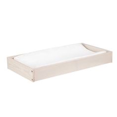 an empty wooden tray with white sheets on the top and bottom, in front of a white background