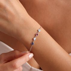 B I R T H S T O N E   B R A C E L E T Our sparkling, shiny and elegant birthstone bracelet will be your indispensable piece.  Birthstone bracelet, which adapts to every outfit and every occasion, will add elegance to you. Your bracelet will arrive to you in a jewelry pouch. * Finish: Sterling Silver ∙ 14K Gold Plated ∙ Rose Gold Plated * Material: High Quality Solid 925 Sterling Silver * Stone: Cubic Zirconia * Stone Size: 4mm * All our jewelry is custom made by hand with Love and Care in our workshop ♡ * The bracelet will be sent with one  inch extension. MONTHS / STONES January - Garnet: Symbolizing love and devotion. February - Amethyst: Representing clarity and inner strength. March - Aquamarine: Conveying courage and hope. April - Diamond: Signifying eternity and strength. May - Emera Mom Christmas Gifts, Family Bracelet, Bracelet Couples, Family Bracelets, Gift For Mom Christmas, Couples Bracelet, Birthstone Bracelet, Mom Christmas, Birthstone Bracelets