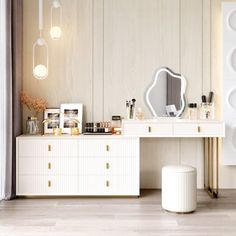 a white vanity and stool in a room