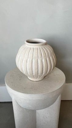 Ceramic vase with curved detailing  Color: beige hue Perfect for adding a unique touch to any space, bar or counter, bathroom, coffee table, or office. Counter Bathroom, Space Bar, Stone Vase, Keramik Vase, Ceramic Vase, Home Accents, Halloween Shopping, Shop House, Coffee Table