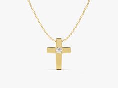 Embrace the power of faith in a minimalist way with the Small Cross Necklace. This understated piece features a delicate cross pendant, perfect for everyday wear and layering. Crafted from gleaming precious metal, the cross serves as a constant reminder of your faith, even when close to your heart. The small size ensures this necklace offers a touch of faith without overwhelming your outfit. It's perfect for those who prefer minimalist jewelry or for everyday wear. FEATURES• Made to Order• Gold Minimalist Yellow Gold Cross Pendant Necklace, Minimalist Yellow Gold Cross Necklace, Elegant Everyday Yellow Gold Cross Necklace, Elegant Yellow Gold Cross Necklace, Small Cross Necklace, Cross Pendant Men, Aquarius Gifts, Rutilated Quartz Ring, Signet Ring Men