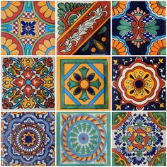 many colorful tiles with different designs on them