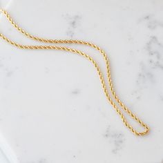 "Simple is always better. The rope chain necklace is an essential piece since it can be worn by itself or layered with other necklaces. D E T A I L S * Made to Order. * 100% 14k Solid Gold * Choice of Gold Color: Yellow Gold, Rose Gold, White Gold * Chain Width: 1.5 mm / 0.05 inch * Length: 14\", 16\", 18\", 20\", 22\" (Got a little note that can help you in the photos.) * Ready to Ship in 1-3 Business Days * 100% US sourced * Free returns within 14 days from the order date A B O U T ∙ U S * All Real Gold Chains, White Gold Chain, Gold Rope Chains, Rope Chain Necklace, Solid Gold Chains, White Gold Chains, Rose Gold White, 14k Gold Necklace, Gold Necklaces