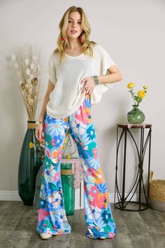 This Item is Final Sale Unleash your wild side with our Everlane Multi Print Flare Pants! These bell bottom pants are not your average pair, with a mix of floral prints that are sure to turn heads. The elastic waist ensures a comfortable fit while the flare design adds a touch of retro style. 95% Polyester & 5% Spandex Print Flare Pants, Printed Flare Pants, Christmas In July Sale, Instagram Help, Boho Pants, Pants Large, Bell Bottom Pants, Pants Design, Kimono Jacket