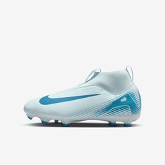 the nike superfly fg soccer shoe is shown in white and light aqua blue