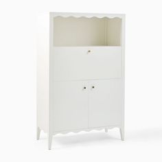 a white cabinet with scalloped shelves and drawers on the front, against a white background