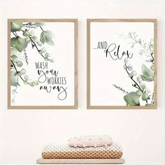 two framed art prints with the words and flowers on them