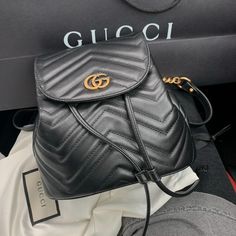 Gucci Backpack Black Calfskin Chevron Antiqued Gold-Tone Hardware Chain-Link Shoulder Straps Chain-Link Accents Microfiber Lining & Single Interior Pocket Snap Closure At Front Base Length: 7.50 In Height: 7.00 In Width: 4.00 In Drop: 14.50 In Only Used A Couple Times Designer Gucci Leather Travel Backpack, Designer Gucci Leather Backpack, Gucci Leather Backpack For Travel, Designer Leather Backpack With Gold-tone Hardware, Luxury Black Leather Backpack With Gold-tone Hardware, Elegant Black Backpack With Gold-tone Hardware, Gucci Black Backpack For Travel, Luxury Gucci Backpack, Black Gucci Backpack For Travel