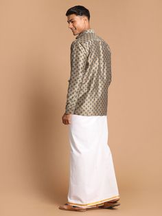 VASTRAMAY Men's Brown Silk Blend Printed Shirt And Mundu Set Experience traditional elegance with the VASTRAMAY Men's Brown Silk Blend Printed Shirt And Mundu Set. Crafted from luxurious silk blend fabric, this set offers a comfortable fit and a sophisticated look, perfect for special occasions. Features Includes a brown silk blend printed shirt Comes with a matching Mundu Traditional yet stylish design Specifications Material: Silk blend Color: Brown Sizes Available: S, M, L, XL Material & Care Traditional Festive Shirt For Formal Occasions, Traditional Long Sleeve Shirt For Eid, Traditional Long Sleeve Festive Shirt, Festive Semi-formal Long Sleeve Shirt, Traditional Formal Tops For Diwali, Classic Long Sleeve Traditional Wear For Eid, Semi-formal Silk Shirt, Traditional Long Sleeve Wedding Shirt, Classic Long Sleeve Festive Traditional Wear