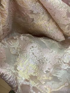 "THIS IS luxurious mulberry 100% organza jacquard brocade design in Italy COLOR: Champagne gold pink WIDTH :60\" inch made in Italy LENGHTE ; SOLD EVERY YARD MULTIPLE YARDS ARE ONE CONTINUOUS CUT CARE : DRY CLEAN ONLY NEED MORE THAN 20 YRDS AND UP PLEASE SEND US EMIL AND WE CAN ACCOMMODATE YOU SO YOU CAN COMPLETE YOUR PARTICULAR PROJECT DISCLAIMER : WE HAVE MADE AN AFFORT TO PROVIDE FABRICS IMAGES THAT COLSELY REPRESENT THE FABRICS HOWEVER DUE TO ALL THE POSSIBLE VARIANTS (e,g,light source monit Elegant Pink Embroidered Fabric For Festive Occasions, Elegant Jacquard Fabric For Wedding, Elegant Organza Fabric For Wedding, Elegant Wedding Organza Fabric, Elegant Fitted Jacquard Embroidered Fabric, Elegant Brocade Fabric For Party, Elegant Organza Fabric For Party, Elegant Festive Jacquard Embroidered Fabric, Elegant Pink Fabric For Party