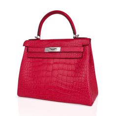 Guaranteed authentic Hermes Kelly 28 bag featured in rich jewel toned Rose Extreme matte alligator. This iconic vibrant pink Hermes bag is timeless and chic. Fresh with palladium hardware. This gorgeous Hermes Kelly bag is a perfect year round beauty.Comes with shoulder strap, sleepers, lock, keys and clochette, raincoat and signature Hermes box.NEW or NEVER WORN.Mightychic shares your passion for exquisite and whimsical Hermes creations and provides you access to that one single item, or to bui Elegant Pink Crocodile Pattern Shoulder Bag, Pink Hermes Bag, Pink Hermes, Designer School Bags, Hermes Kelly Bag, Hermes Kelly 28, Handbag Collection, Hermes Box, Kelly Bag