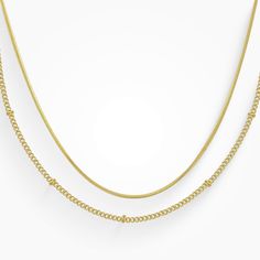 This Lisbon Necklace is the perfect addition to your jewelry box! Its dainty double chain design makes it suitable for any occasion. Put it on to brighten your day and be the envy of all your friends! Minimalist Double Chain Metal Charm Necklaces, Minimalist Double Chain Metal Charm Necklace, Minimalist Metal Charm Necklace With Double Chain, Trendy Gold Plated Delicate Chain Layered Necklace, Minimalist Gold Plated Double Chain Charm Necklace, Metal Double Chain Layered Necklace, Trendy Gold Plated Layered Necklace With Adjustable Chain, Trendy Gold-plated Double Chain Necklace, Trendy Double Snake Chain Necklaces