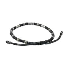 Hill Tribe Style 950 Silver And Black Cord Bracelet - True Balance in Black | NOVICA Adjustable Black Bohemian Bracelets, Traditional Adjustable Black Bracelets, Traditional Black Adjustable Beaded Bracelets, Traditional Black Adjustable Bracelets, Traditional Black Adjustable Bracelet, Black Bohemian Bracelet With Adjustable Cord, Black Bohemian Bracelets With Adjustable Cord, Festival Bracelets With Adjustable Black Beads, Adjustable Black Bohemian Leather Bracelet