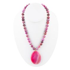 This stunning necklace features genuine pink magenta beads strung together with a beautiful magenta agate slab pendant. The necklace is 17 inches long with an additional 2 inch extender and a secure lobster clasp closure. The pendant measures 2 inches in length and 1.75 inches in width, making it a statement piece. Handcrafted with care, this necklace is sure to stand out with its vibrant pink magenta colors. It weighs 3.5 ounces, making it a comfortable and lightweight accessory to wear. Agate Description: Agate is a variety of chalcedony characterized by its fine grains and bright, multi-colored bands that range from nearly every hue. Commonly found in volcanic rocks, it forms as layers of silica fill cavities within rock, creating its signature banded appearance. Agates are highly versa Adjustable Pink Agate Necklace, Pink Agate Beaded Necklace, Pink Agate Gemstone Bead Necklace, Pink Agate Beaded Necklaces, Pink Agate Pendant Necklace, Fire Agate, Fiery Red, Blue Lace Agate, Bead Stringing