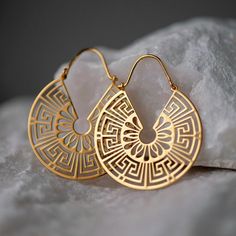 Our Anthemia Ear Hangers are Sterling Silver 925. Order them with your choice of plating: Rhodium or Gold 24K! The Anthemia Ear Hangers come with a high gloss finish.  Each Anthemia earring measures approximately 40 x 33 mm. A stunning ear hangers piece from our Motifs Collection. Sold as a pair, for standard pierced and  stretched ears alike.  HANDMADE IN GREECE We make your jewelry especially for you. Once your order is created & your payment is verified, it will take 5-7 business days for pro Symbolic 14k Gold Pierced Jewelry, Bohemian Gold Hallmarked Jewelry, Symbolic Hallmarked Metal Jewelry, Filigree Hoop Jewelry As A Gift, Filigree Hoop Jewelry Gift, Filigree Hoop Jewelry For Gift, Hallmarked Brass Jewelry, Hallmarked Round Brass Jewelry, Silver Filigree Gold-plated Jewelry