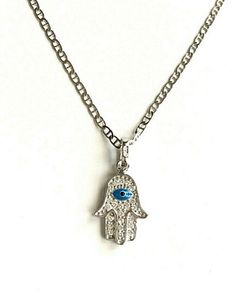 "925 STERLING SILVER HAMSA AND EVIL EYE PENDANT . HAMSA AND EVIL EYE FOR PROTECTION AND GOOD LUCK. 16\" LONG GUCCI CHAIN. PENDANT SIZE 20 X 10 mm CADENA DE 925 PLATA ESTERLINA MANO DE FATIMA Y OJO DE LA BUENA SUERTE. LA MANO DE FATIMA Y OJO PARA BUENA SUERTE Y PROTECCION. 16\" LARGO GUCCI CADENA .. TAMAÑO DEL DIJE : 20 X 10 mm" Spiritual Sterling Silver Charm Necklaces In Silver, Spiritual Sterling Silver Charm Necklace In Silver, Sterling Silver Spiritual Necklace, Sterling Silver Symbolic Jewelry For Good Luck, Symbolic Sterling Silver Jewelry For Good Luck, Silver Pendant Necklace For Good Luck, Sterling Silver Jewelry With Lobster Clasp For Good Luck, Sterling Silver Engraved Necklace For Good Luck, Spiritual Sterling Silver Jewelry For Good Luck