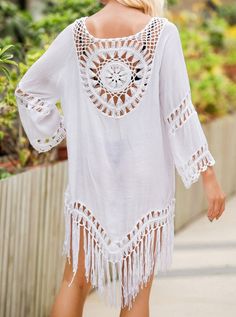 This stylish Beach Tunic is the perfect companion for your pool days. Crafted with resort style fringe knit design, its lightweight construction allows for maximum breathability and comfort. Perfect for lounging by the poolside, this tunic is sure to be a favorite! Style: Boho Chic Pattern Type: Solid Material: Nylon, Polyester, Rayon, Cotton Cotton Beach Cover-up For Beach Season, Summer Cotton Cover-up For Vacation, Beachwear V-neck Cover-up With Tassels, Cotton Beach Season Cover-up For Vacation, Beach Season Cotton Cover-up For Vacation, Beachy Cotton Cover-up For Vacation, Bohemian Lightweight Cover-up For Beach Party, Summer V-neck Cover-up With Tassels, Summer V-neck Tassel Cover-up