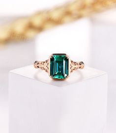 ♥Details Lab Emerald Engagement Ring - Comfortable Band About Rings All rings are handmade in the United States Metal: Solid 14K & 18K Gold Gold Color: Rose gold, Yellow gold, White gold Engagement ring Center Stone:7*9mm Emerald Cut Lab Emerald Weight: 2.89g (may vary depending on the ring size) Shank: 1.5mm(shank width) & 1.1mm(shank thickness) ♥ Custom or Personalized The ring can be made with other types or sizes gemstones, please approach me to let me know your ideas and get a quote. ♥Payme Classic Rose Gold Emerald Jewelry, Elegant Octagon Emerald Ring With Accent Stones, Elegant Octagon Emerald Ring With Prong Setting, Elegant Baguette Cut Emerald Ring For Promise, Exquisite Emerald Cut Ring For Promise, Elegant Rose Gold Ring With Emerald, Elegant Rose Gold Emerald Ring For May Birthstone, Elegant Emerald Rose Gold Rings, Elegant Rose Gold Emerald Rings