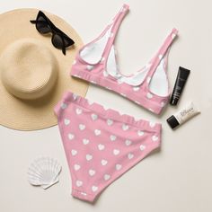 It’s too easy to fall in love with this bikini set. Removable pads and its double-layer make it comfy to wear all day by the pool or at the beach.• Fabric composition recycled polyester, 19% LYCRA XTRALIFE• Double-layered and non-reversible• Removable padding• Tear-away care label• Zig-zag stitching EU sourced from Spain, Germany, Taiwan, Vietnam, Cambodia, and Lithuania from Colombia, Taiwan, and ChinaThis product is made especially for you as soon as you place an order, which is why it takes us a bit longer to deliver it to you. Making products on demand instead of in bulk helps reduce overproduction, so thank you for making thoughtful purchasing decisions! Cute Tankini For Beach Season Vacation, Cute Swimwear For Beach Season Sunbathing, Cute Swimwear For Sunbathing Beach Season, Cute Swimwear For Sunbathing In Beach Season, Cute Pink Tankini For Poolside, Cute Pink Tankini For Beach Season, Cute Pink Tankini For Vacation, Cute Pink Swimwear For Beach Party, Trendy Pink High Waist Swimwear