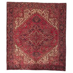 an antique persian rug with red and beige colors