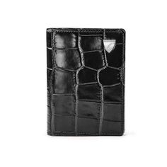 a black alligator skin wallet on a white background