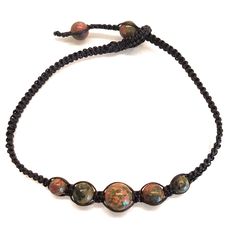 PRICES MAY VARY. A Beautiful Handmade Anklet Bracelet made with 4, 6, 8 m.m. of Unakite Stone woven with wax Cord, Macrame Anklet for Men, Women, Teengirl or Boyfriend ADJUSTABLE CLOSERS WITH 2 pieces of 6 M.M.Stone: 10-11 inches Length Adjustable Size. Due to the natural property of the stone and handcarved nature, each of them might have difference. Green pouch packaging for storage and a nice gift. A great gift for Valentines's Day, Thanksgiving, Motherâs Day, Christmas, Engagement, Vacation, Crystal Barefoot Sandals, Macrame Anklet, Western Fashion Jewelry, Leather Anklets, Handmade Anklets, Christmas Engagement, Foot Bracelet, Bracelet Macrame, Hanging Beads