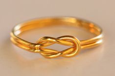 🌍 FREE DHL Express SHIPPING WORLDWIDE, Delivery in just 2-3 days 💝Fall Sales 10% Personalized gift for her, rings for women, boyfriend Christmas gift Hercules Knot A handmade ring , gold wire 1 mm k18 , plain and simple unique jewelry. Unique design, a ring that combines Ancient Greek style and Contemporary jewellery. It can also be made of Sterling Silver gold plated. MATERIALS: gold wire 1 mm k18 DIMENSIONS: HANDMADE: Every piece is totally handmade at my workshop and therefore may have very Heracles Knot Ring, Modern Twist Gold Stackable Rings As Gift, Modern Twist Wire Wrapped Rings As Gift, Modern Twist Wire Wrapped Rings For Gifts, Gold Stackable Rings As Gift With Modern Twist, Wire Wrapped Rings As A Modern Gift, Modern Twist Gold Rings As Gift, Gold Rings With A Modern Twist As A Gift, Gold Rings With A Modern Twist For Gift