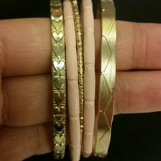 Gold & Pink Assorted Bangles Colors: Pink, Gold Brand New Never Worn Pink Bracelets For Spring Parties, Spring Party Pink Bracelets, Trendy Pink Metal Bracelets, Trendy Pink Metal Bracelet, Pink Metal Bracelets For Party, Elegant Pink Bracelets For Spring, Chic Adjustable Pink Bracelets, Chic Adjustable Pink Bracelet, Pink Metal Bangle Bracelet