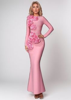 This 3D Floral Decor Long Sleeve Maxi Dress features a beautiful round neck and a flattering mermaid hem. The unique 3D floral decor adds a touch of elegance and sophistication to this dress. With its versatile long sleeves, it is perfect for any occasion. In a lovely shade of pink, this maxi dress is sure to make a statement. Fabric: Slight Stretch Material: Polyester Feminine Long Sleeve Evening Dress, Pink Mermaid Wedding Dress For Spring, Spring Wedding Pink Mermaid Dress, Spring Pink Mermaid Dress, Long Sleeve Fitted Dress With Floral Applique, Pink Long Sleeve Elegant Mermaid Dress, Pink Long Sleeve Mermaid Dress For Evening, Pink Elegant Long Sleeve Mermaid Dress, Elegant Pink Long Sleeve Mermaid Dress