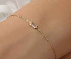 14k Gold Rose Quartz Bracelet / Solid Gold / Rose Gold White Gold / Baguette Stone with Bezel Setting / LOVE means Rose Quartz Bracelet ✔ Handmade ✔ Solid Gold ✔ Setting Size: 3.5mm x 7 mm ✔ Rose Quartz Ct Weight: .20ctw Available 14K Solid White, Solid Yellow, Solid Rose Gold Worldwide DHL shipping now available 1-3 business days NOW USING ITALIAN TRIGGER LOBSTER CLASPS 🛠 All Sarah Elise pieces are handcrafted to order, please allow 4 - 10 business days for shipping out. Need it sooner? Just a Rose Quartz Bracelets, Elegant Rose Quartz Gemstone Bracelets, Elegant Rose Quartz Gemstone Bracelet, Elegant Bracelet With Rectangular Stone For Gift, Elegant Rose Gold Crystal Bracelet With Rose Quartz, Elegant Rose Quartz Crystal Bracelet For Gift, Elegant Rose Quartz Crystal Bracelet Gift, Elegant Rose Quartz Rose Gold Bracelets, Elegant Rose Gold Rose Quartz Bracelets