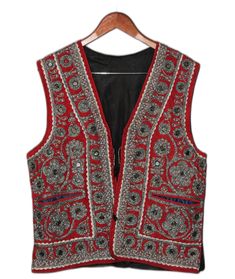 Made in Afghanistan, this a rare find vintage sleeveless waistcoat. Hand embroidery on velvet. A very antique piece in mint condition.  Measurements: Shoulder: 18 inch Chest: 21.5 inch Lenght: 26 inch Note: Worn and minor signs of wear. Festive Vest With Intricate Embroidery, Festive Sleeveless Vest With Intricate Embroidery, Sleeveless Embroidered Vest For Festive Occasions, Festive Sleeveless Embroidered Vest, Festival Vest With Intricate Embroidery, Festive Bohemian Vest With Intricate Embroidery, Traditional Sleeveless Vest For Festive Occasions, Traditional Sleeveless Festive Vest, Traditional Red Vest For Festival