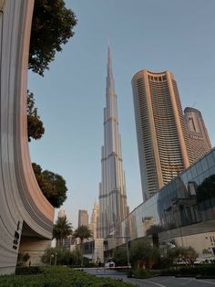 the burj building is surrounded by tall buildings