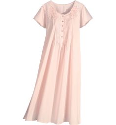 You'll drift back to a gentler time every night you put on this charming 100% cotton nightgown. It's generously cut for comfort and finished with thoughtful details like pintucking on the bodice, floral appliqués, and lace trim along the neckline and short sleeves. It's the simple things that make each day a treasure.Summer-weight cotton for hot nights and warm sleepersTrimmed in beautiful laceSide-seam pockets and side slits at the hemApprox. 50" longAvailable Women's Plus sizesMachine wash and Cotton Sleepwear With Lace Trim For Bedtime, Feminine Cotton Sleep Dress, Feminine Cotton Sleepover Dress, Cotton Loungewear Dresses With Lace Trim, Cotton Dresses With Lace Trim For Loungewear, Feminine Cotton Dress For Sleepover, Cotton Nightgown With Lace Trim For Sleep, Cotton Lounge Dresses With Lace Trim, Pink Cotton Nightgown With Lace Trim