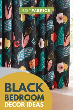 black bedroom curtains with colorful flowers and green leaves on the window sill, in front of