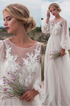 a woman wearing a white dress with sheer sleeves and flowers in her hair, holding a bouquet