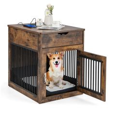 a dog in a crate with its door open