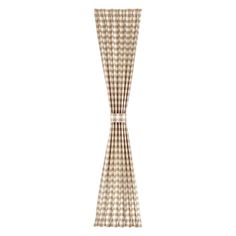 a brown and white checkered curtain hanging on a wall