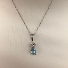 Gorgeous Aqua Marine And Diamond Pendant On Dainty Silver Chain. Chain Is 18” In Length. I Received This As A Gift Many Years Ago And Never Wore It. Will Send It In The Black Case It Came In. The Case Is Not In Great Shape. Was Purchased At Macy’s. Reasonable Offers Will Be Considered. Elegant Silver Chain Drop Necklace, Classic Silver Briolette Diamond Necklace, Classic Silver Diamond Necklace With Briolette Cut, Silver Drop Chain Jewelry, Silver Briolette Diamond Necklace Fine Jewelry, Silver Briolette Diamond Necklace In Fine Jewelry Style, Elegant Silver Teardrop Necklace, Elegant Silver Chain Necklace For Formal Occasions, Classic Sterling Silver Necklace With Briolette Shape