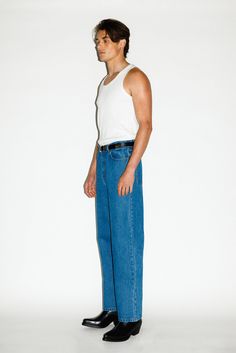 A classic pair of straight-leg jeans inspired by the off-duty uniform of 90's runway models. Designed to pinch just above the hips, the high-rise and roomy straight-leg elongates the leg for a rugged, boyish cut. Constructed in a rigid, non-stretch denim, these go-to jeans only gets better with age. Pair with the match High Waist Jeans Men, Rigid Denim Flare Jeans With Straight Hem, Relaxed Fit Flare Jeans With Straight Hem, Everyday Flare Jeans With Straight Hem In Rigid Denim, Straight Fit Rigid Denim Cropped Jeans, Straight Fit Cropped Jeans With Rigid Denim, Modern Flare Jeans With Straight Hem, Classic Rigid Denim Flare Jeans For Everyday, Classic Flare Jeans In Rigid Denim For Everyday