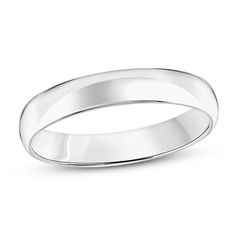 This classic wedding band is crafted of 14K white gold. The band is 4mm in width. Classic Stackable Marriage Rings, Classic White Gold Rings With Shiny Finish, Classic White Gold Oval Bands, Classic White Gold Rings, Classic Jewelry For Marriage, Classic Round Band Promise Ring, Classic Round Band For Promise Ring, Classic 14k White Gold Round Band, Classic Thick Band With Diamond Cut